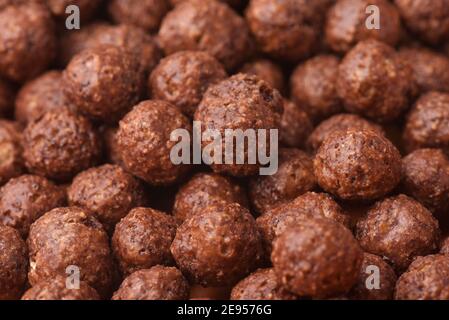 Close up of chocolate cereal balls background Stock Photo