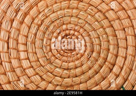 Close up of circular cane wicker background texture Stock Photo