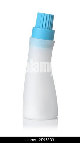 Plastic basting bottle with silicone brush isolated on white Stock Photo