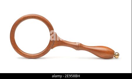 Vintage magnifying glass in wooden frame isolated on white Stock Photo