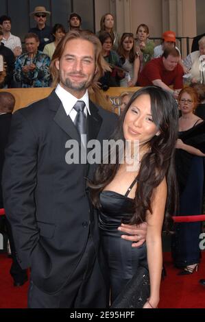 Josh Holloway and his wife Yessica Kumula attends the 12th Annual Screen Actors Guild Awards at the Shrine Auditorium in Los Angeles, CA, USA on January 29, 2006. Photo by Lionel Hahn/ABACAPRESS.COM Stock Photo