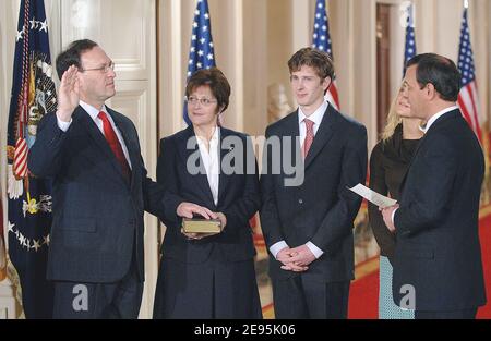 U.S. Supreme Court Justice Samuel Alito is sworn in by Chief Justice John Roberts (R) as his wife Martha, son Philip and daughter Laura look on during a ceremonial swearing-in at the East Room of the White House February 1, 2006 in Washington, DC. Photo by Olivier Douliery/ABACAPRESS.COM Stock Photo