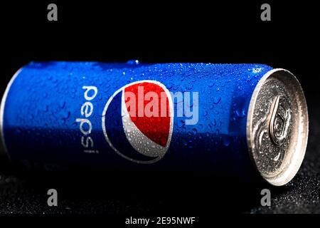 Editorial photo of Pepsi can with water droplets on black background. Studio shot in Bucharest, Romania, 2021 Stock Photo