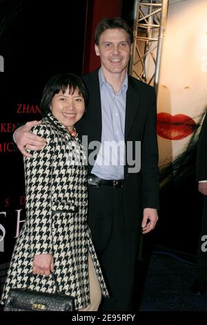 French president Jacques Chirac adopted daughter, Ahn Dao Traxel, and her husband Emmanuel Traxel attend the French premiere of 'Memoirs Of A Geisha' held at the UGC Normandie cinema in Paris, France, on February 16, 2006. Photo by Benoit Pinguet/ABACAPRESS.COM Stock Photo
