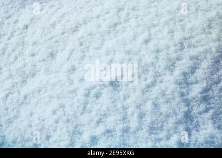 Abstract background of fresh snows texture. Blue toned snowy background. Winter background photo. snowy texture. Stock Photo