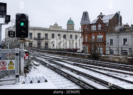 View of train tracks at Brixton Station during heavy snow, Brixton, London, 24 January 2021 Stock Photo