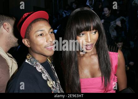US singer Pharrell Williams and Louis Vuitton CEO Yves Carcelle attend Louis  Vuitton's Fall-Winter 2006-2007 Ready-to-wear collection presentation in  Paris, France, on March 5, 2006. Photo by  Orban-Taamallah-Zabulon/ABACAPRESS.COM Stock Photo - Alamy