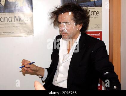 belgian-noel-godin-and-his-friends-throwes-custard-pie-at-french-writer-bernard-henri-levy-during-the-paris-book-fair-le-salon-du-livre-held-at-porte-de-versailles-in-paris-france-on-march-18-2006-photo-by-bruno-kleinabacapresscom-2e96765.jpg