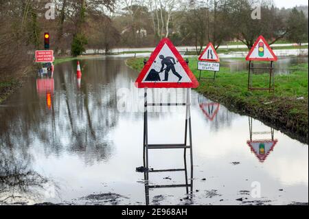 Cookham, Berkshire, UK. 2nd February, 2021. A Flood Alert is in place in Cookham as the River Thames has burst it's banks. The B4447 road across Cookham Moor has been closed as it is flooded. The Environment Agency were on hand today pumping out drains. Credit: Maureen McLean/Alamy Live News Stock Photo