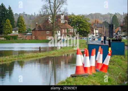 Cookham, Berkshire, UK. 2nd February, 2021. A Flood Alert is in place in Cookham as the River Thames has burst it's banks. The B4447 road across Cookham Moor has been closed as it is flooded. The Environment Agency were on hand today pumping out drains. Credit: Maureen McLean/Alamy Live News Stock Photo