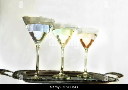 Three martinis served on a silver tray Stock Photo