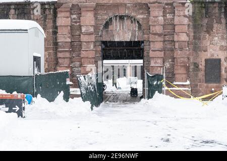 New York, United States. 02nd Feb, 2021. Maintenance worker clears snow in Castle Clinton in Battery Park covered with snow after major snowfall the day before brought more than foot on the ground in New York on February 2, 2021. (Photo by Lev Radin/Sipa USA) Credit: Sipa USA/Alamy Live News Stock Photo