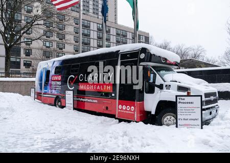 Mobile COVID-19 rapid testing vehicle covered with snow seen in Battery Park after major snowfall the day before in New York on February 2, 2021. (Photo by Lev Radin/Sipa USA) Stock Photo