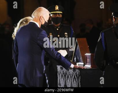Washington, United States. 02nd Feb, 2021. U.S. President Joe Biden and first lady Jill Biden arrive to honor the late Capitol Police officer Brian Sicknick who lies in honor in the Rotunda of the Capitol in Washington, DC on February 2, 2021. Officer Sicknick died after engaging with rioters on January 6th while protecting the Capitol from the insurrection mob that stormed the U.S. Capitol building while congress was certifying the election of President Joe Biden. Pool Photo by Leah Millis/UPI Credit: UPI/Alamy Live News Stock Photo