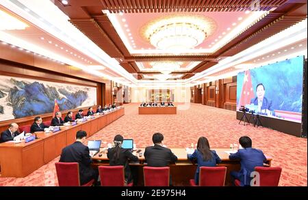 Beijing, China. 2nd Feb, 2021. Wang Chen, a member of the Political Bureau of the Communist Party of China Central Committee and vice chairman of the National People's Congress (NPC) Standing Committee, addresses a video conference between the NPC and the China-Bridge association of Germany in Beijing, capital of China, Feb. 2, 2021. Wang co-chaired the video conference with Hans-Peter Friedrich, vice president of the German Bundestag. Credit: Li Xiang/Xinhua/Alamy Live News Stock Photo