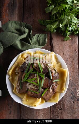 Asian Kazakh national dish beshbarmak Stock Photo