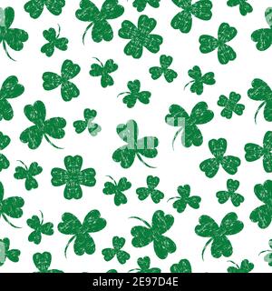 Saint Patricks Day. Vector illustration. White background with a shamrock. Seamless Pattern. Grunge effect, scrapes Stock Vector