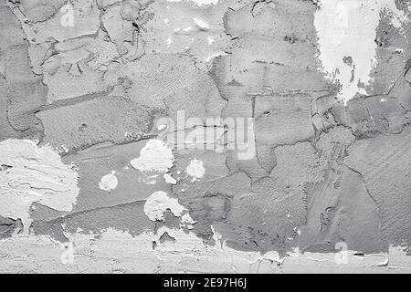 The texture of the cement mortar wall. The texture of the gray plaster is casually applied to the surface of the wall Stock Photo