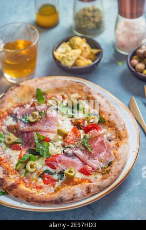 Pizza with ham and vegetables Stock Photo