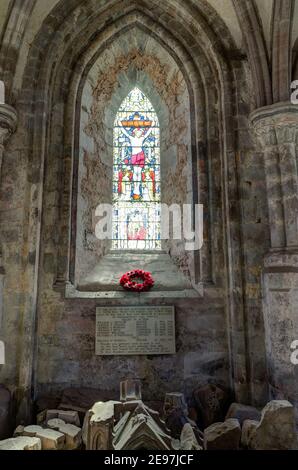 Dore Abbey interior, a former Cistercian abbey, now a parish church, Golden Valley, Herefordshire: stained glass window above the WW1 memorial Stock Photo