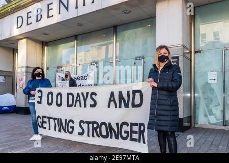 Cork, Ireland. 3rd Feb, 2021. Ex-Debenhams workers have now been picketing Debenhams stores for 300 days. Workers in Cork held a small protest, due to Covid-19, outside the Patrick Street store this morning to mark the milestone. Cork Shop Steward Valerie Conlon says there is still no sign of a resolution. Credit: AG News/Alamy Live News Stock Photo