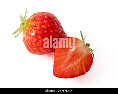 Strawberry whole and half isolated on white. Ripe fresh organic strawberry from own garden, isolated on white background with clipping path. Stock Photo