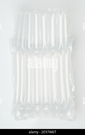 Bubble safety parcel wrap isolated on studio background. Secure packing shipping theme Stock Photo