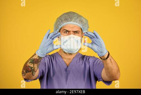 making virus test. developed vaccines. outbreak of new coronavirus in China. How virus is transmitted. health worker wear mask while research test tube in lab. more radical measures. selective focus. Stock Photo