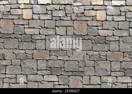 The texture of the concrete floor - top view and a close-up view of a fragment of a paving stone pavement Stock Photo