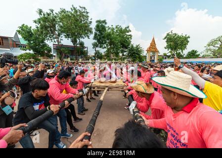 Chaiyaphum, Thailand - May 12, 2019: Parade of ancient pre-ordination of Buddhist which pre-monk on bamboo litter shaken severely before ordination in Stock Photo