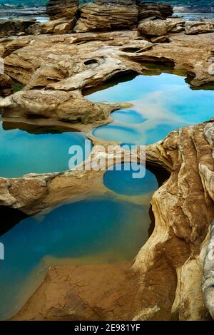 canyon and water hole at sam phan bok on the riverside of the mekong river Thailand Stock Photo