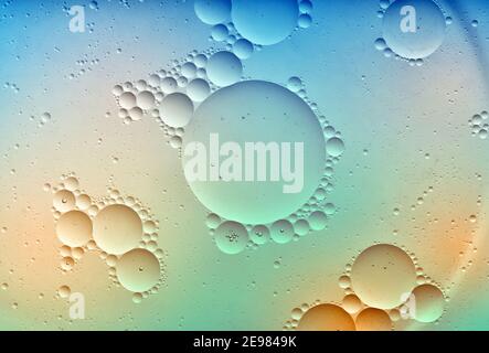 Closeup top view of colorful textured background with round shaped bubbles of different sizes Stock Photo