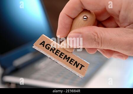 Agreement printed on rubber stamp Stock Photo