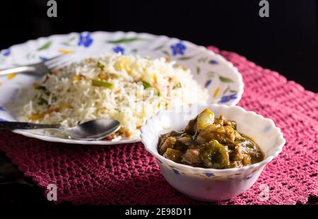 selective focus on fried rice and chilli chicken - popular chinese foods of India Stock Photo
