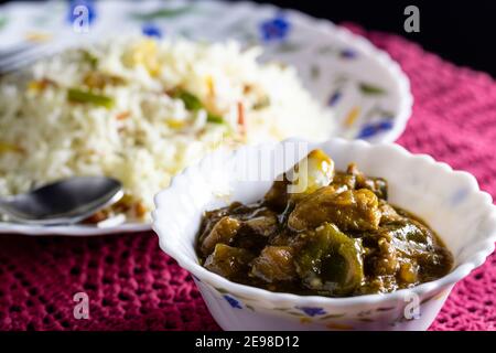 selective focus on fried rice and chilli chicken - popular chinese foods of India Stock Photo