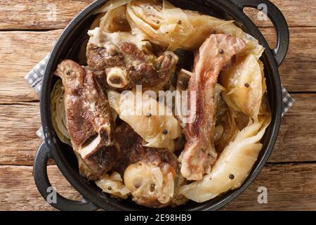 lamb and cabbage or known as farikal is Norway's national dish close-up in a pan on the table. Horizontal top view from above Stock Photo