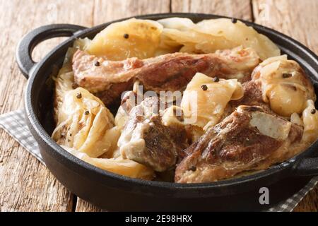 lamb and cabbage or known as farikal is Norway's national dish close-up in a pan on the table. Horizontal Stock Photo