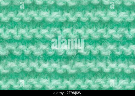 Turquoise, Mint Color Knitwear Fabric Texture. Machine Knitting Texture Macro Snapshot. Knitted Background. Stock Photo