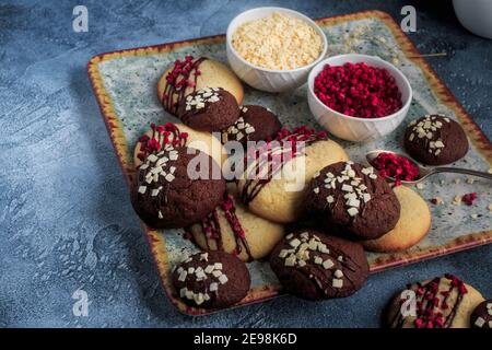 Homemade Vanila and Chocolate cookies. Sugar Cookies. Cookies with Raspberry and Chocolate topping. Stock Photo