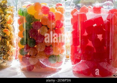 Jars of sweets in a shop window Stock Photo