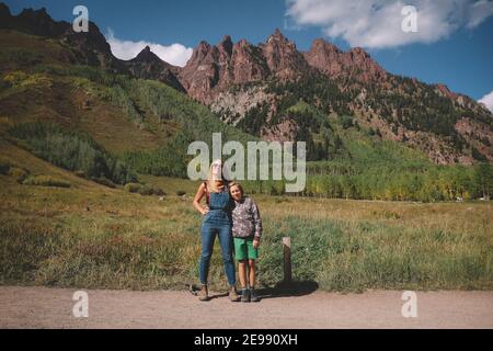 Mother and Son standing in Front of Seivers Mountain South on a Sunny Stock Photo