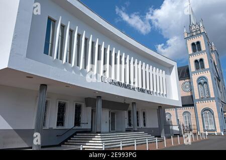 De Surinaamsche Bank / DSB / Bank of Suriname and wooden Roman Catholic Saint Peter and Paul Cathedral in the city Paramaribo, Suriname Stock Photo