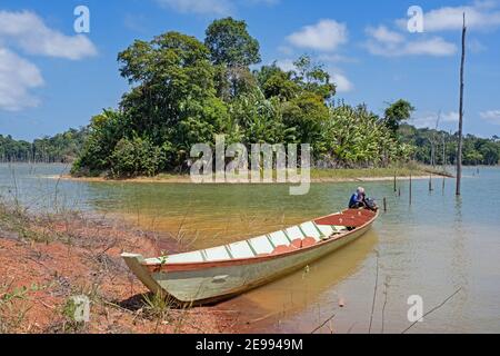 Wooden tourist boat at Brokopondo reservoir / Brokopondostuwmeer, artificial lake created by constructing the Afobaka Dam across the Suriname River Stock Photo