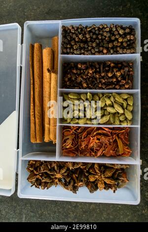 indian dry Spice separate box in kitchen for cooking lot of flavor in vegetable. Stock Photo