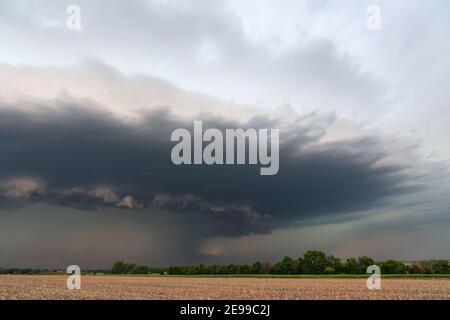 Dark storm cloud and heavy rain from a thunderstorm near Taylor, Nebraska Stock Photo