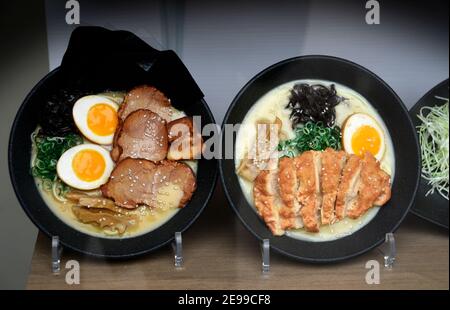 Japanese sampuru, realistic-looking models of food items, on display outside a restaurant in the Japantown area of San Francisco, California. The wax, Stock Photo