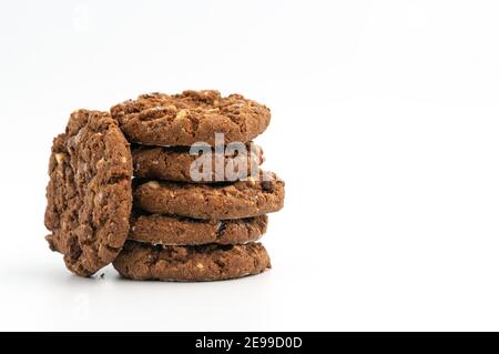 Stack of homemade sweet chocolate cookies isolated on white. Stock Photo