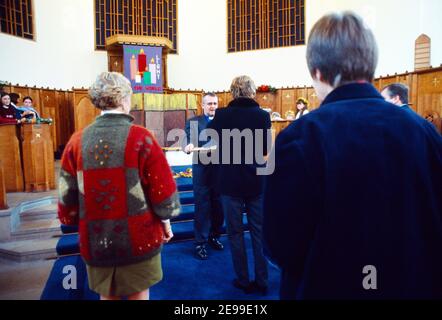 Collection At Church Service At Christmas St Andrew's United Reform Church (presbyterian) Surrey England Stock Photo