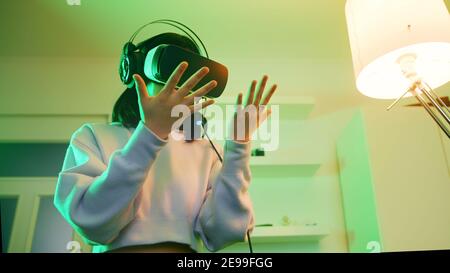 Young asian woman experiencing Virtual reality. . High quality photo Stock Photo