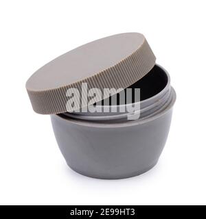 Old plastic jar with lid isolated on white background Stock Photo